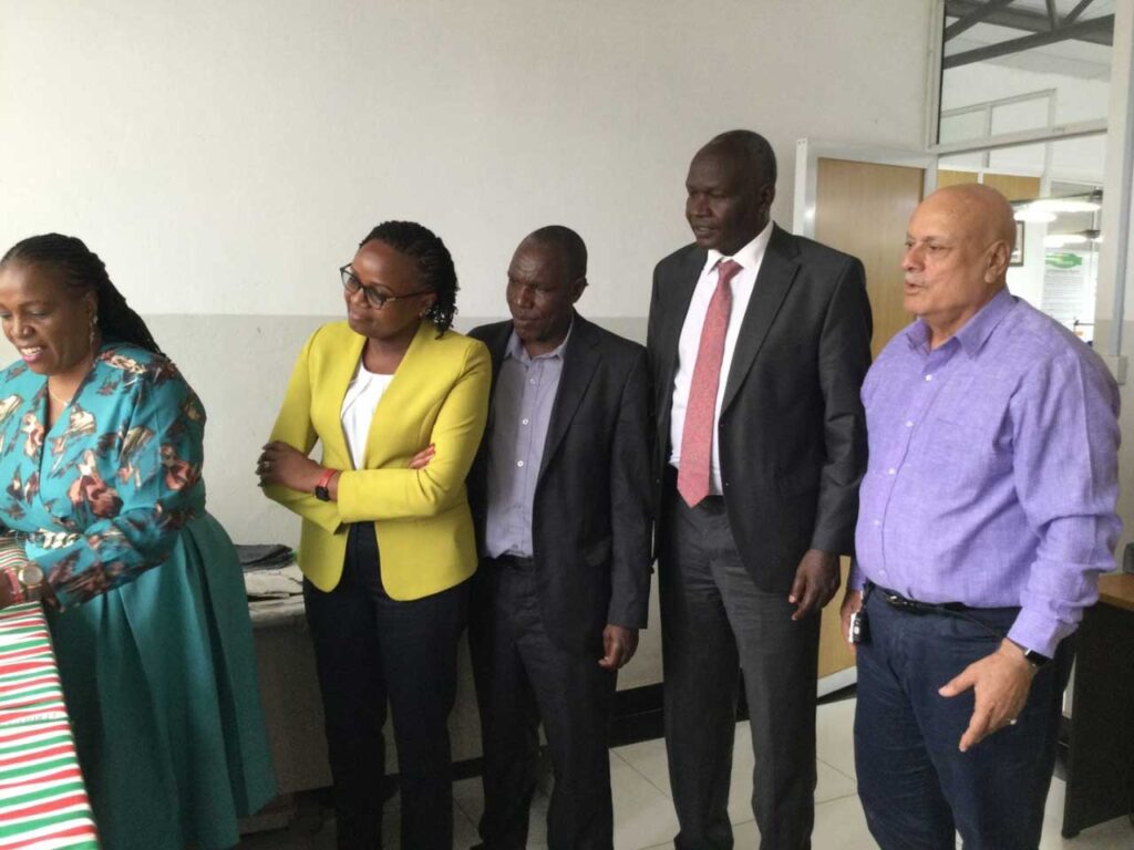 KNQA Leadership getting a demonstration of the dexterity test